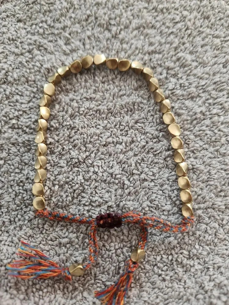 Pulsera tibetana completa con borlas